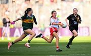 12 July 2025; Zoey Clarke, St. Patrick's National School, Shercock, Cavan, representing Tyrone, and Clodagh Keane, St. Colmcille’s National School, Mullingar, Westmeath, representing Kerry, during the GAA INTO Cumann na mBunscol Respect Exhibition Go Games match at the GAA Football All-Ireland Senior Championship semi-final match between Kerry and Tyrone at Croke Park in Dublin. Photo by Seb Daly/Sportsfile