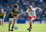 12 July 2025; Patrick Keogh, Milford Grange National School, Castletroy, Limerick, representing Kerry, in action against Tadhg McCormack, St. Conleth's National School, Carbury, Kildare, representing Tyrone, during the GAA INTO Cumann na mBunscol Respect Exhibition Go Games match at the GAA Football All-Ireland Senior Championship semi-final match between Kerry and Tyrone at Croke Park in Dublin. Photo by Ray McManus/Sportsfile
