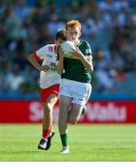 12 July 2025; Liam Walsh, Scoil Eoin Baiste, Lios Póil, Chiarraí, in action against Lucas O Cinsealaigh, Scoil Oilibheir, Cluain Saielach, Átha Cliath, ionadaíocht Tír Eoghain, during the GAA INTO Cumann na mBunscol Respect Exhibition Go Games match at the GAA Football All-Ireland Senior Championship semi-final match between Kerry and Tyrone at Croke Park in Dublin. Photo by Ray McManus/Sportsfile