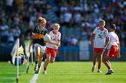 12 July 2025; Adam Kelly, St Kieran's National School, Clonmacnois, Offaly, representing Kerry, in action against Daniel Blake, Tinahely National School, Tinahely, Wicklow, representing Tyrone, during the GAA INTO Cumann na mBunscol Respect Exhibition Go Games match at the GAA Football All-Ireland Senior Championship semi-final match between Kerry and Tyrone at Croke Park in Dublin. Photo by Ray McManus/Sportsfile
