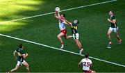 12 July 2025; Brian Kennedy of Tyrone in action against Evan Looney of Kerry during the GAA Football All-Ireland Senior Championship semi-final match between Kerry and Tyrone at Croke Park in Dublin. Photo by Ramsey Cardy/Sportsfile