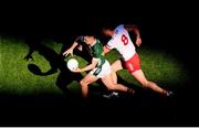 12 July 2025; Dylan Casey of Kerry in action against Brian Kennedy of Tyrone during the GAA Football All-Ireland Senior Championship semi-final match between Kerry and Tyrone at Croke Park in Dublin. Photo by Ramsey Cardy/Sportsfile