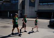 13 July 2025; Meath supporters walk pass Croke Park before the GAA Football All-Ireland Senior Championship semi-final match between Meath and Donegal at Croke Park in Dublin. Photo by Ray McManus/Sportsfile