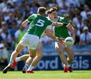 12 July 2025; Eoin Cully of Kildare in action against Killian Ryan, 5, and Barry Coleman of Limerick during the Tailteann Cup final match between Kildare and Limerick at Croke Park in Dublin. Photo by Ray McManus/Sportsfile