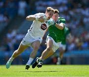 12 July 2025; Daniel Flynn of Kildare in action against Jason Hassett of Limerick during the Tailteann Cup final match between Kildare and Limerick at Croke Park in Dublin. Photo by Ray McManus/Sportsfile