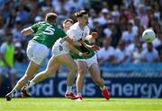 12 July 2025; Eoin Cully of Kildare in action against Killian Ryan, 5, and Barry Coleman of Limerick during the Tailteann Cup final match between Kildare and Limerick at Croke Park in Dublin. Photo by Ray McManus/Sportsfile