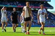 12 July 2025; Kildare goalkeeper Cian Burke, 1, and substitute Brian McLoughlin, 24, leave the field with the cup after the Tailteann Cup final match between Kildare and Limerick at Croke Park in Dublin. Photo by Ray McManus/Sportsfile