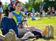 13 July 2025; Aishling Rehill from Dublin with Bran the chihuahua before the 2025 Irish Life Dublin Race Series – Fingal 10km which took place on Sunday, 13th July at Swords in Dublin. Photo by Sam Barnes/Sportsfile