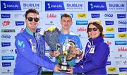 13 July 2025; Men's race winner Tadgh Donnelly, of Drogheda and District AC, Louth, centre, is presented with the trophy by Councillor for Swords Luke Corkery and Irish Life Senior Manager Corporate Reputation & Sponsorship Siobhan Kelly after the 2025 Irish Life Dublin Race Series – Fingal 10km which took place on Sunday, 13th July at Swords in Dublin. Photo by Sam Barnes/Sportsfile