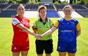13 July 2025; Referee Angela Gallagher with Louth captain Áine Breen, left, and Longford captain Eimear O'Brien before the TG4 All-Ireland Ladies Football Junior Championship semi-final match between Louth and Longford at St Tiernach’s Park in Clones, Monaghan. Photo by Ben McShane/Sportsfile
