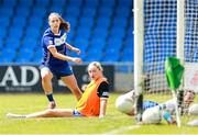 13 July 2025; Mo Nerney of Laois on her way to scoring her side's third goal despite the efforts of Caoimhe Brennan of Monaghan and goalkeeper Katie Sherlock during the TG4 All-Ireland Ladies Football Intermediate Championship semi-final match between Laois and Monaghan at Glennon Brothers Pearse Park in Longford. Photo by Thomas Flinkow/Sportsfile