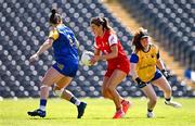 13 July 2025; Eimear Byrne of Louth gets past the tackle of Longford goalkeeper Aoife Cooney on her way to scoring her side's first goal during the TG4 All-Ireland Ladies Football Junior Championship semi-final match between Louth and Longford at St Tiernach’s Park in Clones, Monaghan. Photo by Ben McShane/Sportsfile