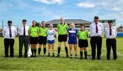 13 July 2025; From left, match officials and players, umpires, Linesperson Sandra Shanagher, 4th official Kevin Corcoran, Monaghan captain Amy Garland, referee Gerard Canny, Laois captain Andrea Moran, Linesperson Maura Connealy, and umpires before the TG4 All-Ireland Ladies Football Intermediate Championship semi-final match between Laois and Monaghan at Glennon Brothers Pearse Park in Longford. Photo by Thomas Flinkow/Sportsfile