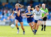 13 July 2025; Eva Galvin of Laois in action against Shona Brady of Monaghan during the TG4 All-Ireland Ladies Football Intermediate Championship semi-final match between Laois and Monaghan at Glennon Brothers Pearse Park in Longford. Photo by Thomas Flinkow/Sportsfile