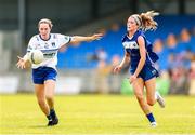 13 July 2025; Lauren Garland of Monaghan in action against Eva Galvin of Laois during the TG4 All-Ireland Ladies Football Intermediate Championship semi-final match between Laois and Monaghan at Glennon Brothers Pearse Park in Longford. Photo by Thomas Flinkow/Sportsfile