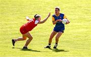 13 July 2025; Mairead Victory of Longford in action against Aoife Halligan of Louth during the TG4 All-Ireland Ladies Football Junior Championship semi-final match between Louth and Longford at St Tiernach’s Park in Clones, Monaghan. Photo by Ben McShane/Sportsfile