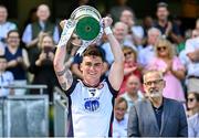 13 July 2025; New York captain Conor Mathers lifts the cup after his side's victory in the GAA Football All-Ireland Junior Championship final match between New York and London at Croke Park in Dublin. Photo by Seb Daly/Sportsfile