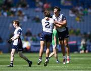 13 July 2025; New York players Rory O'Riordan, 2, and Dylan Curran celebrate at the final whistle after the GAA Football All-Ireland Junior Championship final match between New York and London at Croke Park in Dublin. Photo by John Sheridan/Sportsfile