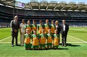 13 July 2025; Uachtarán Chumann Lúthchleas Gael Jarlath Burns, INTO President Anne Horan, President of Cumann na mBunscol, and Mini-Sevens co-ordinator Bernie Ryan, with the Donegal team, back row, left to right, Oisin Campbell, Realt na Mara National School, Dunmore East, Waterford, Michael McGowan, Killoughteen National School, Newcastle West, Limerick, Theodore O'Brien, Maree National School, Oranmore, Galway, Stephen Mulchrone, St Peters National School, Castlebar, Mayo, Toby Barry Swann, Dualla National School, Dualla, Cashel, Tipperary, front row, left to right, Billy O'Keeffe, Carrigeen National School, Carrigeen, Kilkenny, Jack Dowds, Glenswilly National School, Glenswilly, Donegal, Donnacha Mulligan, Scoil Mhuire, Moycullen, Galway, Daniel Gallagher, The Quay National School, Ballina, Mayo, Oisin Carr, St Francis National School, Barnesmore, Donegal, before the GAA INTO Cumann na mBunscol Respect Exhibition Go Games at the GAA Football All-Ireland Senior Championship semi-final match between Meath and Donegal at Croke Park in Dublin. Photo by Daire Brennan/Sportsfile
