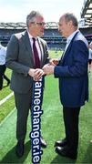 13 July 2025; An Taoiseach and Ministers today called on everyone to join the movement to tackle gender-based violence at Game Changer ‘Activation Day’ in Croke Park.  Pictured at the Activation Day for a new public awareness campaign for the Game Changer programme during the All-Ireland Football Semi-Final and Junior Championship Final are An Taoiseach Micheál Martin, T.D, aND Uachtarán Chumann Lúthchleas Gael Jarlath Burns and other special guests on pitch at Croke Park for GAA Game Changer Activations, including a flag unfurling ceremony, before the GAA Football All-Ireland Senior Championship semi-final match between Meath and Donegal. Photo by Ray McManus/Sportsfile
