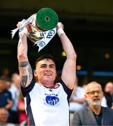 13 July 2025; New York captain Conor Mathers lifts the cup after his side's victory in the GAA Football All-Ireland Junior Championship final match between New York and London at Croke Park in Dublin Photo by Ray McManus/Sportsfile