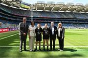 13 July 2025; Uachtarán Chumann Lúthchleas Gael Jarlath Burns, INTO President Anne Horan, President of Cumann na mBunscol, and Mini-Sevens co-ordinator Bernie Ryan, with the referees Ryan Kelly and Emma Brennan, both from Scoil Phádraig NS, Ballylinan, Laois, before the GAA INTO Cumann na mBunscol Respect Exhibition Go Games at the GAA Football All-Ireland Senior Championship semi-final match between Meath and Donegal at Croke Park in Dublin. Photo by Daire Brennan/Sportsfile