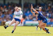 13 July 2025; Éabha Sherry of Monaghan in action against Sinéad Farrelly of Laois during the TG4 All-Ireland Ladies Football Intermediate Championship semi-final match between Laois and Monaghan at Glennon Brothers Pearse Park in Longford. Photo by Thomas Flinkow/Sportsfile