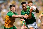 13 July 2025; Ciarán Caulfield of Meath in action against Eoghan Bán Gallagher of Donegal during the GAA Football All-Ireland Senior Championship semi-final match between Meath and Donegal at Croke Park in Dublin. Photo by Seb Daly/Sportsfile