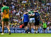 13 July 2025; Bryan Menton of Meath leaves the pitch to receive medical attention for an injury during the GAA Football All-Ireland Senior Championship semi-final match between Meath and Donegal at Croke Park in Dublin. Photo by Piaras Ó Mídheach/Sportsfile