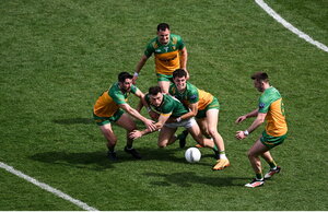 13 July 2025; Jordan Morris of Meath in action against Donegal players, left to right, Ryan McHugh, Caolan McColgan, Finnbarr Roarty, and Eoghan Bán Gallagher during the GAA Football All-Ireland Senior Championship semi-final match between Meath and Donegal at Croke Park in Dublin. Photo by Daire Brennan/Sportsfile