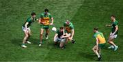 13 July 2025; Bryan Menton of Meath in action against Michael Murphy of Donegal during the GAA Football All-Ireland Senior Championship semi-final match between Meath and Donegal at Croke Park in Dublin. Photo by Daire Brennan/Sportsfile
