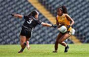 13 July 2025; Omolara Dahunsi of Antrim in action against Claire Dunne of Sligo during the TG4 All-Ireland Ladies Football Junior Championship semi-final match between Antrim and Sligo at St Tiernach’s Park in Clones, Monaghan. Photo by Ben McShane/Sportsfile
