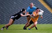13 July 2025; Bronagh Devlin of Antrim is tackled by Hannah Walsh, left, and Sligo goalkeeper Ellen Maguire during the TG4 All-Ireland Ladies Football Junior Championship semi-final match between Antrim and Sligo at St Tiernach’s Park in Clones, Monaghan. Photo by Ben McShane/Sportsfile