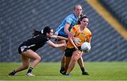 13 July 2025; Bronagh Devlin of Antrim is tackled by Hannah Walsh, left, and Sligo goalkeeper Ellen Maguire during the TG4 All-Ireland Ladies Football Junior Championship semi-final match between Antrim and Sligo at St Tiernach’s Park in Clones, Monaghan. Photo by Ben McShane/Sportsfile