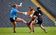 13 July 2025; Bronagh Devlin of Antrim is tackled by Hannah Walsh, right, and Sligo goalkeeper Ellen Maguire during the TG4 All-Ireland Ladies Football Junior Championship semi-final match between Antrim and Sligo at St Tiernach’s Park in Clones, Monaghan. Photo by Ben McShane/Sportsfile