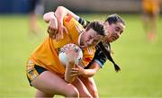 13 July 2025; Sarah O'Neill of Antrim is tackled by Sarah Feeney of Sligo during the TG4 All-Ireland Ladies Football Junior Championship semi-final match between Antrim and Sligo at St Tiernach’s Park in Clones, Monaghan. Photo by Ben McShane/Sportsfile