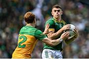 13 July 2025; Eoghan Frayne of Meath in action against Ciaran Moore of Donegal the GAA Football All-Ireland Senior Championship semi-final match between Meath and Donegal at Croke Park in Dublin. Photo by Piaras Ó Mídheach/Sportsfile