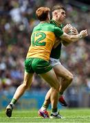 13 July 2025; Eoghan Frayne of Meath in action against Ciaran Moore of Donegal the GAA Football All-Ireland Senior Championship semi-final match between Meath and Donegal at Croke Park in Dublin. Photo by Piaras Ó Mídheach/Sportsfile