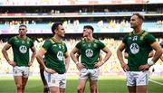 13 July 2025; Meath players, from left, Conor Gray, James McEntee, Conor Duke and Shane Walsh after their side's defeat in the GAA Football All-Ireland Senior Championship semi-final match between Meath and Donegal at Croke Park in Dublin. Photo by Seb Daly/Sportsfile