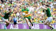 13 July 2025; Michael Murphy of Donegal is tackled by Meath players, from left, Ciaran Thompson and Shane O'Donnell  during the GAA Football All-Ireland Senior Championship semi-final match between Meath and Donegal at Croke Park in Dublin. Photo by John Sheridan/Sportsfile