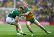 13 July 2025; Seán Rafferty of Meath in action against Ryan McHugh of Donegal during the GAA Football All-Ireland Senior Championship semi-final match between Meath and Donegal at Croke Park in Dublin. Photo by John Sheridan/Sportsfile