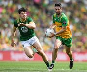 13 July 2025; Ryan McHugh of Donegal in action against Seamus Lavin of Meath during the GAA Football All-Ireland Senior Championship semi-final match between Meath and Donegal at Croke Park in Dublin. Photo by John Sheridan/Sportsfile
