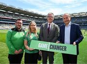 13 July 2025; An Taoiseach and Ministers today called on everyone to join the movement to tackle gender-based violence at Game Changer ‘Activation Day’ in Croke Park. Pictured at the Activation Day for a new public awareness campaign for the Game Changer programme during the All-Ireland Football Semi-Final and Junior Championship Final are Jason & Claire Poole, Erin's Isle GAA club; Uachtarán Chumann Lúthchleas Gael Jarlath Burns, Taoiseach Michéal Martin at Croke Park for GAA Game Changer Activations, including a flag unfurling ceremony, before the GAA Football All-Ireland Senior Championship semi-final match between Meath and Donegal. Photo by Ray McManus/Sportsfile