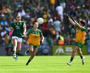 13 July 2025; Laoise Kirrane, St Patrick's National School, Curry, Sligo, representing Meath,  in action against Ayda Pearson, St John's National School, Ballisodare, Sligo, representing Donegal, during the GAA INTO Cumann na mBunscol Respect Exhibition Go Games match at the GAA Football All-Ireland Senior Championship semi-final match between Meath and Donegal at Croke Park in Dublin. Photo by Ray McManus/Sportsfile