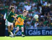 13 July 2025; Billy O'Keeffe, Carrigeen National School, Carrigeen, Kilkenny, representing Donegal, is tackled by Ciarán Ryan, Barefield National School, Ennis, Clare, representing Meath, during the GAA INTO Cumann na mBunscol Respect Exhibition Go Games match at the GAA Football All-Ireland Senior Championship semi-final match between Meath and Donegal at Croke Park in Dublin. Photo by Ray McManus/Sportsfile