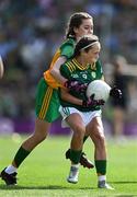 13 July 2025; Sophia Grace, Rathgormack National School, Rathgormack, Waterford, representing Meath, is tackled by Mischa McNulty, Gortletteragh N.S, Gortletteragh, Leitrim, representing Donegal during the GAA INTO Cumann na mBunscol Respect Exhibition Go Games match at the GAA Football All-Ireland Senior Championship semi-final match between Meath and Donegal at Croke Park in Dublin. Photo by Ray McManus/Sportsfile