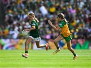 13 July 2025; Holly Brady, Scoil Mhuire, Newtownforbes, Longford, representing Meath, in action against Siún Crowe, Scoil Mhuire, Lacken, Cavan, representing Donegal, during the GAA INTO Cumann na mBunscol Respect Exhibition Go Games match at the GAA Football All-Ireland Senior Championship semi-final match between Meath and Donegal at Croke Park in Dublin. Photo by Ray McManus/Sportsfile
