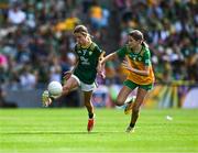 13 July 2025; Holly Brady, Scoil Mhuire, Newtownforbes, Longford, representing Meath, in action against Siún Crowe, Scoil Mhuire, Lacken, Cavan, representing Donegal, during the GAA INTO Cumann na mBunscol Respect Exhibition Go Games match at the GAA Football All-Ireland Senior Championship semi-final match between Meath and Donegal at Croke Park in Dublin. Photo by Ray McManus/Sportsfile