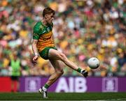 13 July 2025; Ciaran Moore of Donegal kicks a point during the GAA Football All-Ireland Senior Championship semi-final match between Meath and Donegal at Croke Park in Dublin. Photo by Seb Daly/Sportsfile