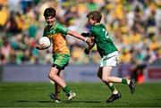 13 July 2025; Theodore O'Brien, Maree National School, Oranmore, Galway, representing Donegal, in action against David Judge, Bayside Senior School, Sutton, Dublin, representing Meath, during the GAA INTO Cumann na mBunscol Respect Exhibition Go Games match at the GAA Football All-Ireland Senior Championship semi-final match between Meath and Donegal at Croke Park in Dublin. Photo by Seb Daly/Sportsfile